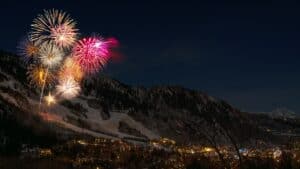 fireworks over snowy town sales planning